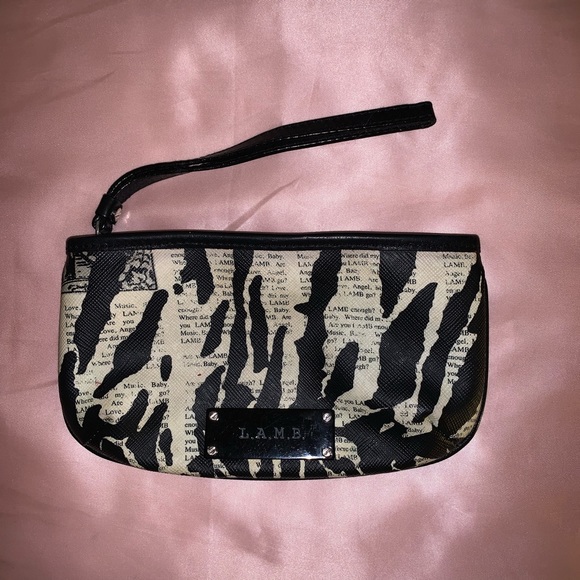 L.A.M.B. Handbags - L.A.M.B. Newspaper Zebra Print Clutch ๐ฆ L.A.M.B. Handbags - L.A.M.B. Newspaper Zebra Print Clutch ๐ฆ